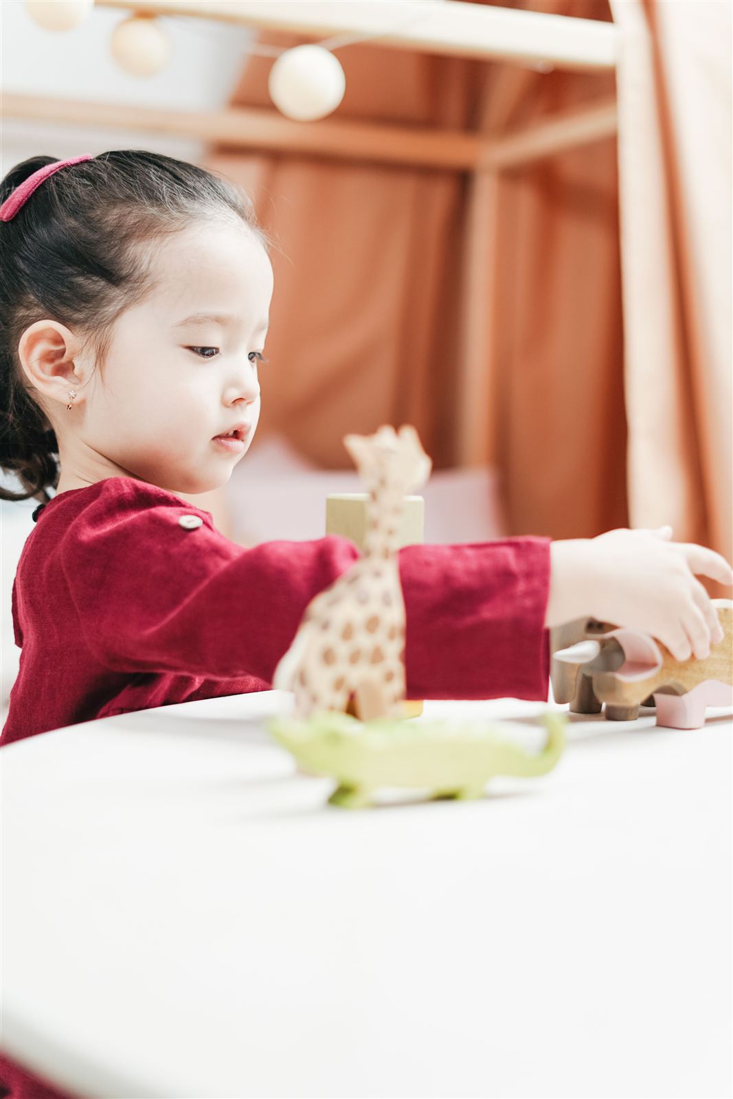 Toddler exploring sensory materials