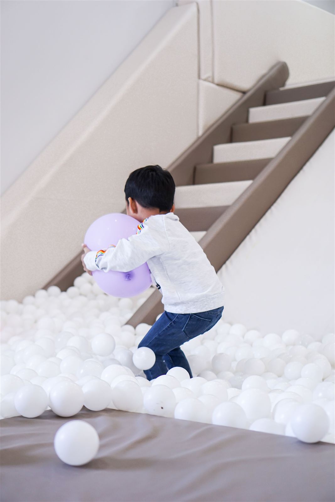 Kindergarten-age child at joyful, active play