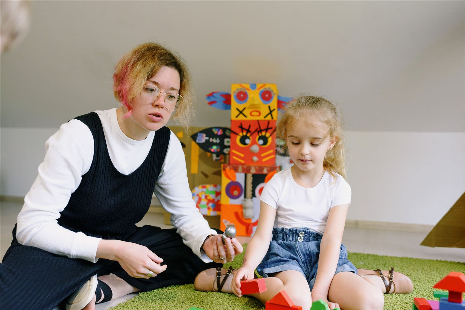 Infant being cared for by a nurturing educator