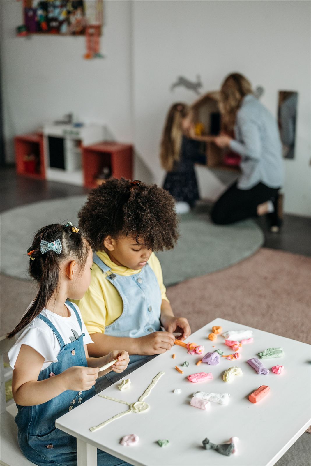 Children working with Montessori materials